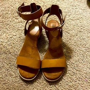 Cute and casual ankle strap sandal with a small heel.